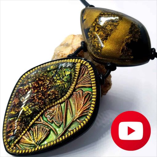 Unusual pendant with polymer clay beads #26608